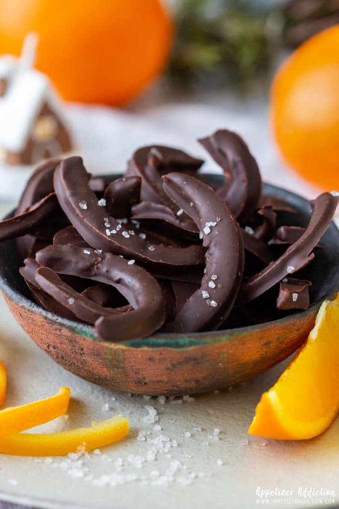 Chocolate covered orange peels topped with sea salt.