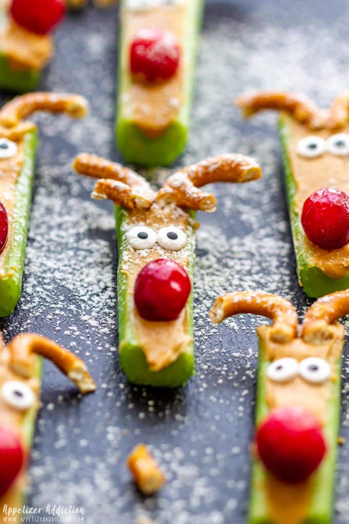 Rudolph celery snacks with cranberry red nose.