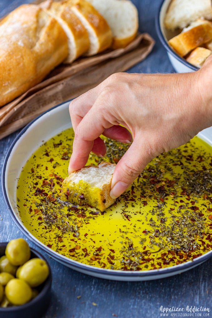 Dipping bread to the homemade dipping oil.