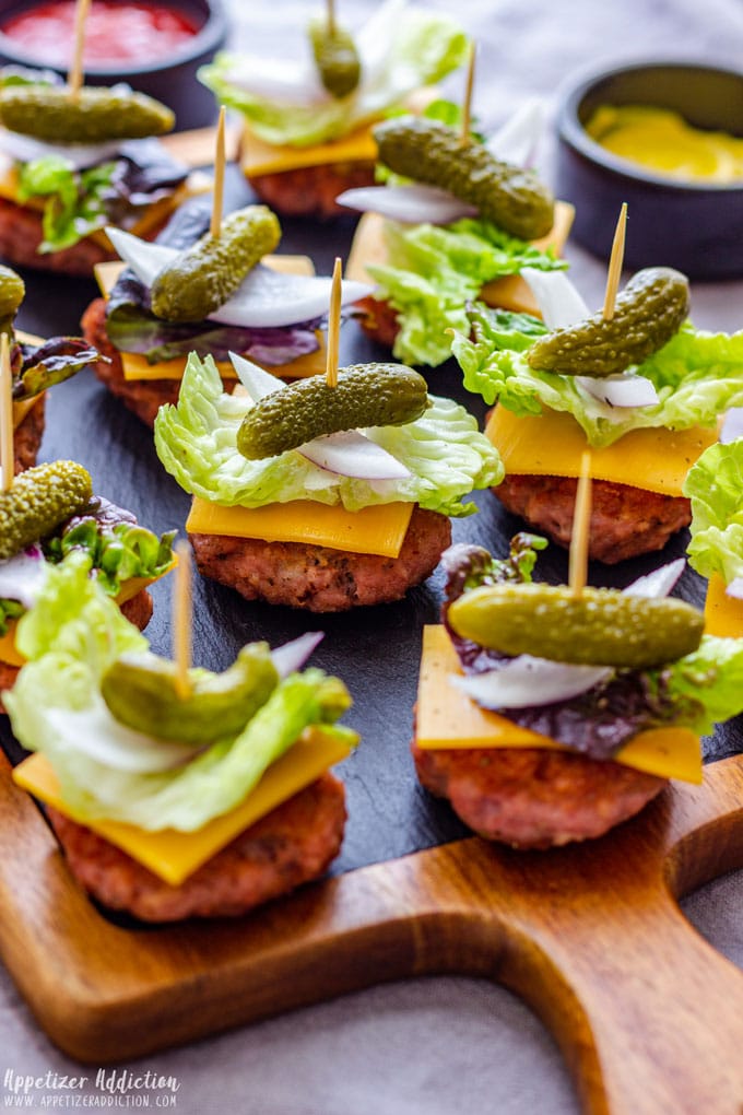 Bunless cheeseburger bites with dill pickles.