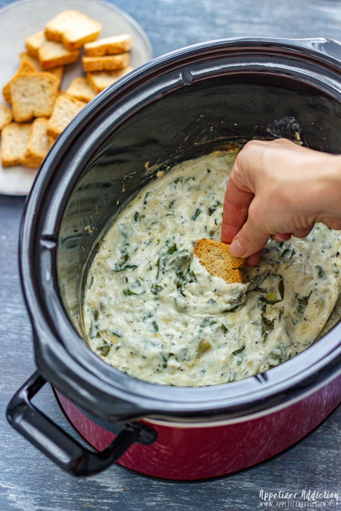 Scooping the Slow Cooker Spinach Artichoke Dip