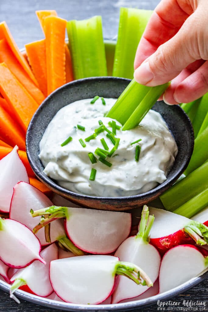 Dipping Celery to Blue Cheese Dip