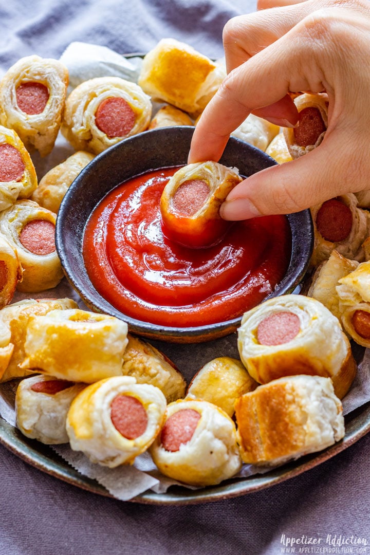 Eating Mini Pigs in a Blanket