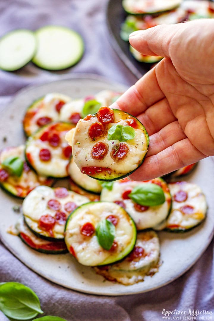 Zucchini Pizza Bites on the Hand