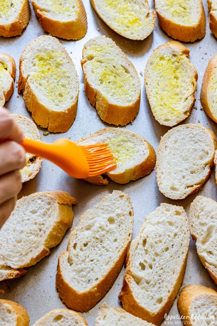 Brushing Crostini with Olive Oil