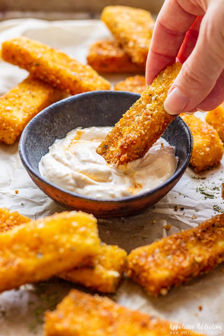 Dipping Polenta Fries to the Garlic Sauce