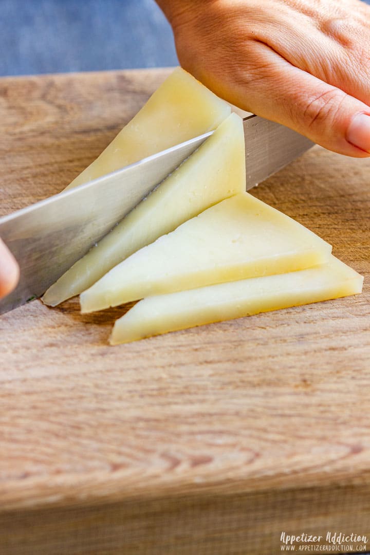 Slicing manchego cheese