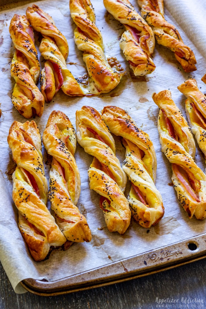 Homemade puff pastry twists with bacon