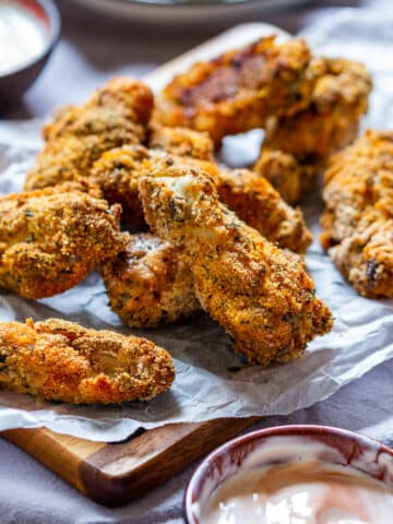 Homemade breaded crispy chicken wings with a dip