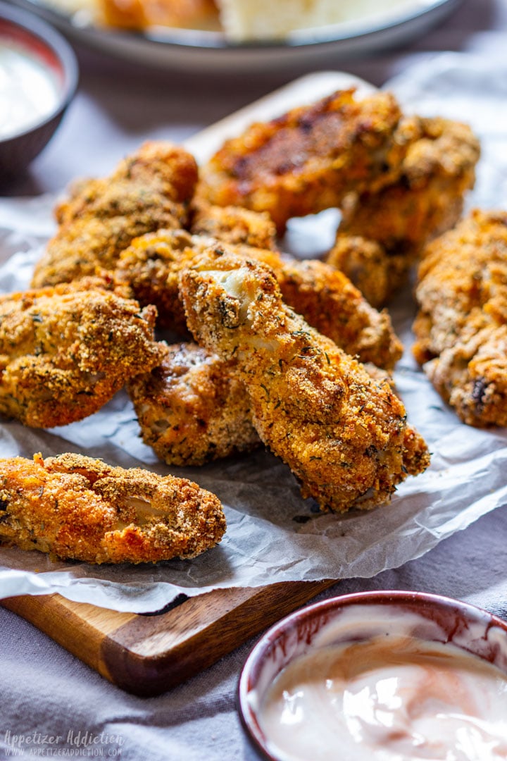 Homemade breaded crispy chicken wings with a dip