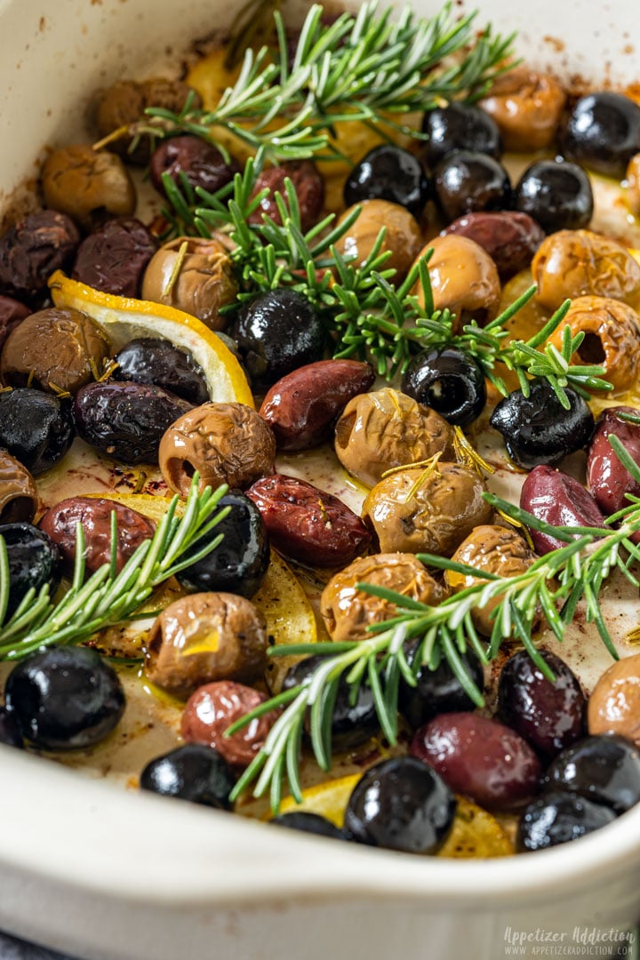 Oven baked olives in baking dish