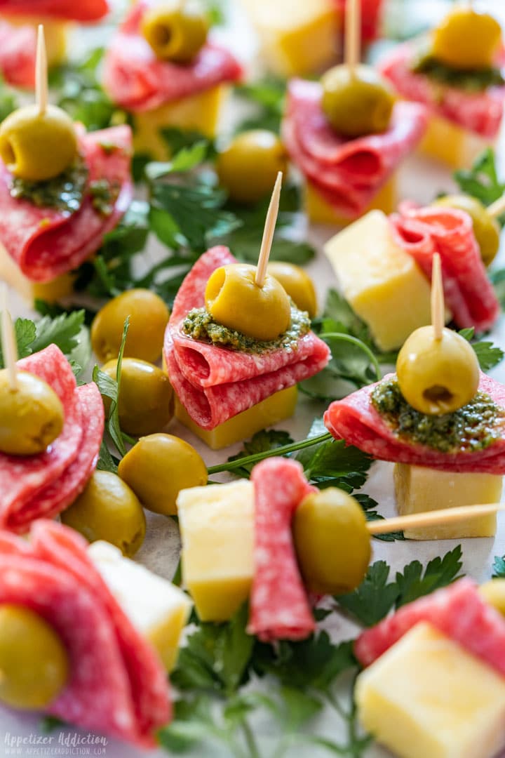 Salami and cheese skewers with olives