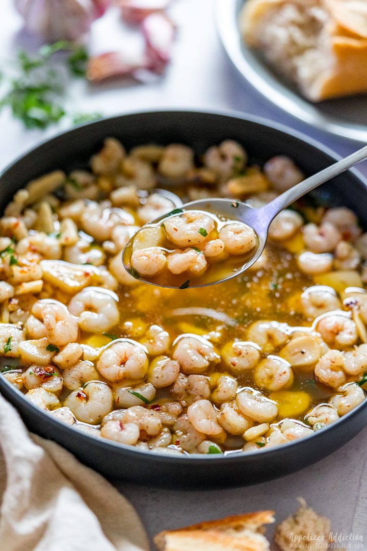 Spoonful of shrimp in garlic