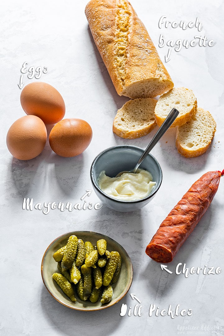 Chorizo crostini ingredients: French baguette, mayonnaise, eggs, chorizo and dill pickles