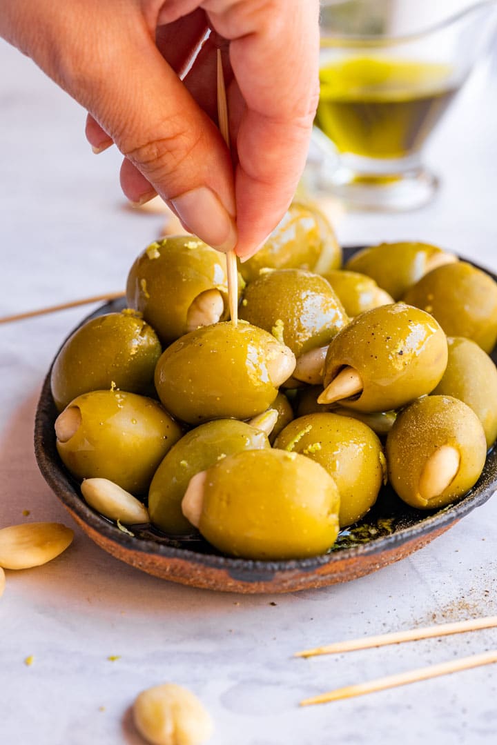 Eating almond stuffed olives