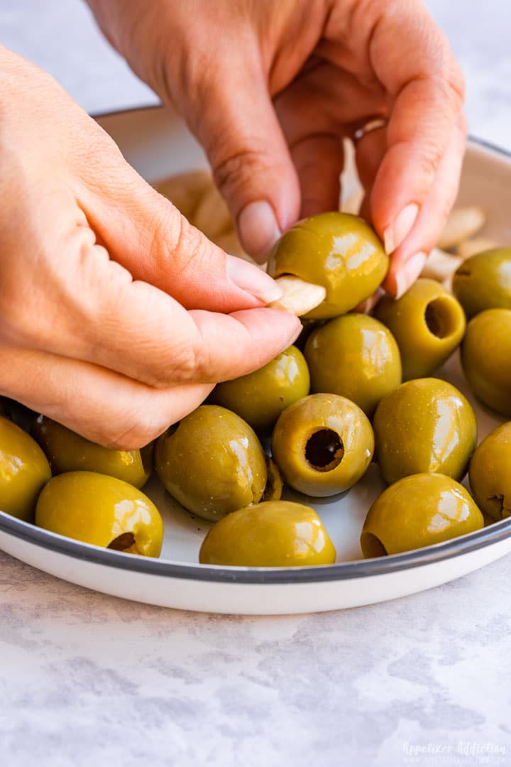 Stuffing olives with almonds