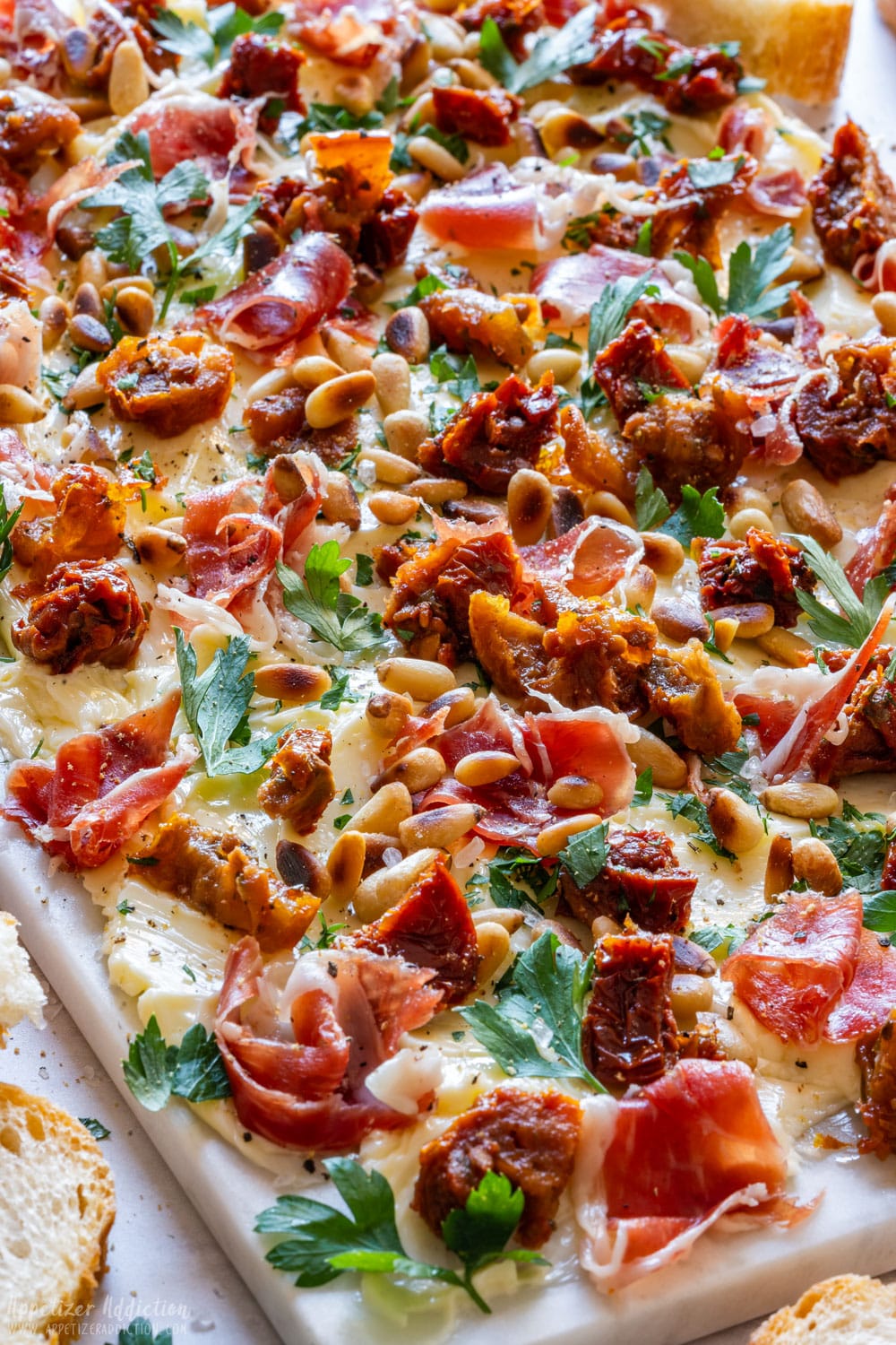 Stylish butter board with various toppings ready to be served.