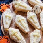 Halloween coffin sandwiches with spiders, ghost and pumpkin.