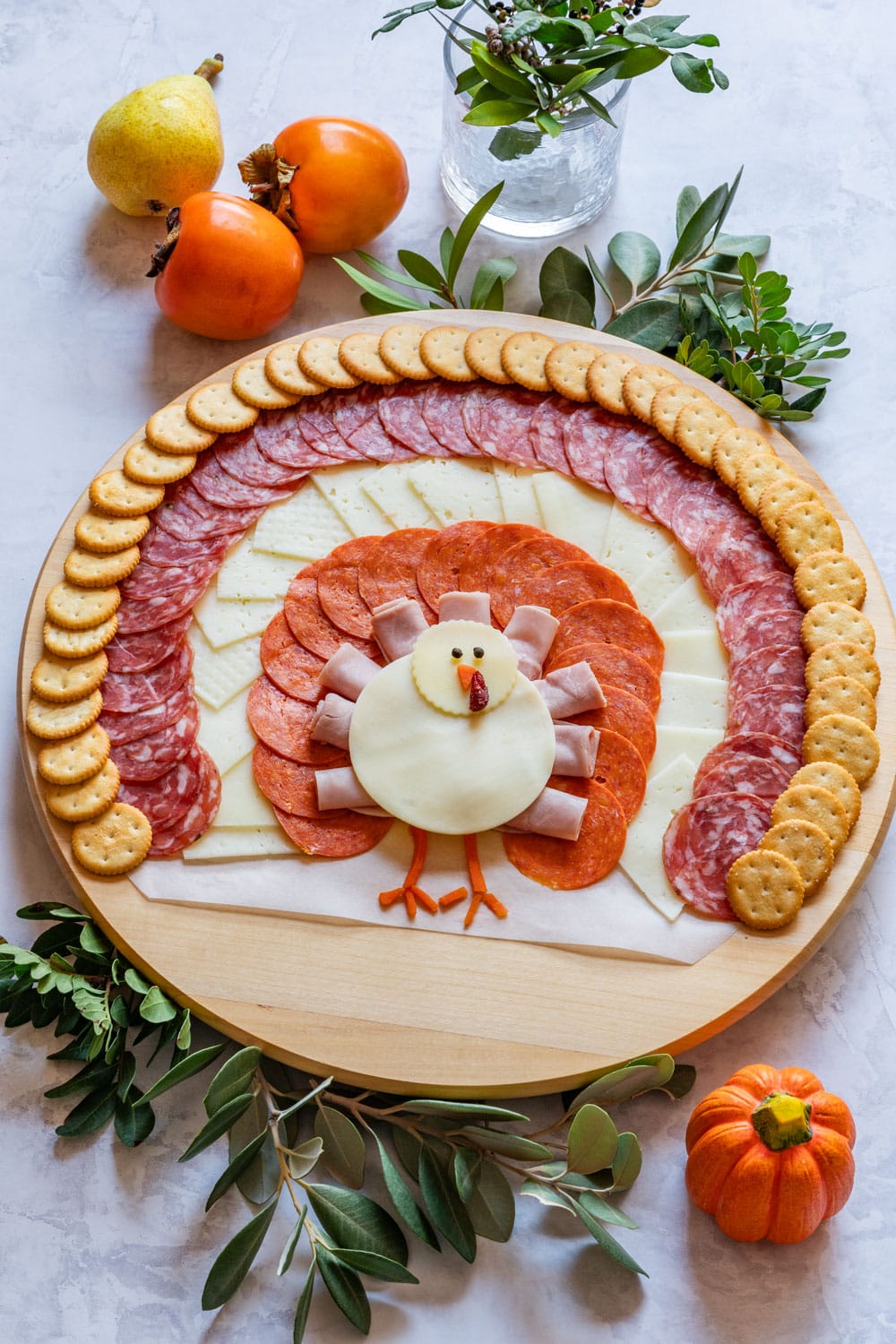 Turkey shaped charcuterie board for Thanksgiving.