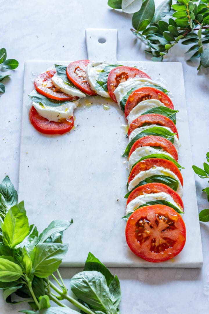 Tomato, basil and mozzarella appetizer - candy cane Caprese board.