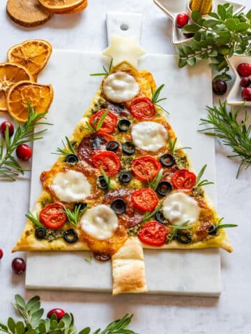 Festive Christmas tree shaped pizza.