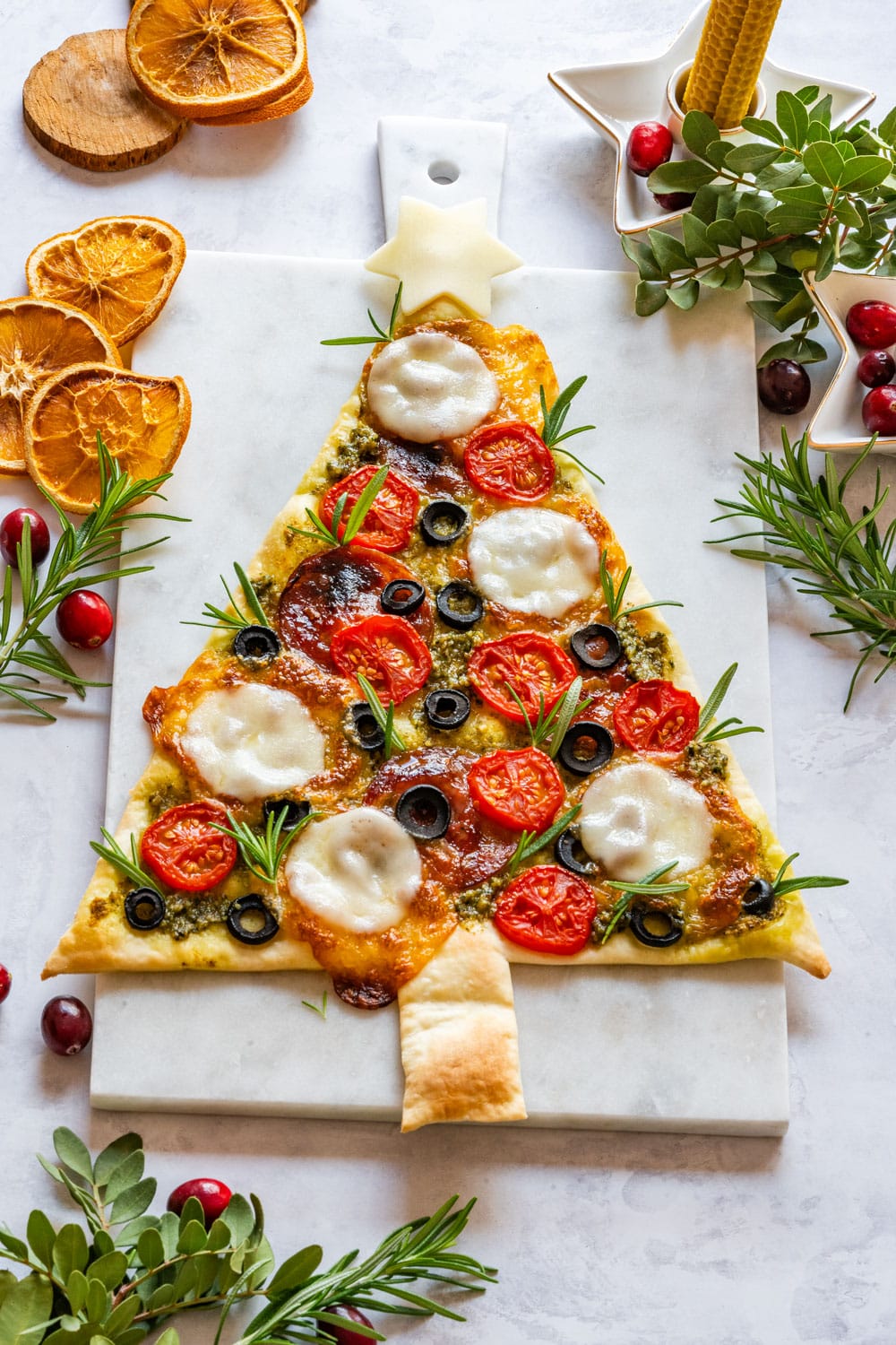 Festive Christmas tree shaped pizza.