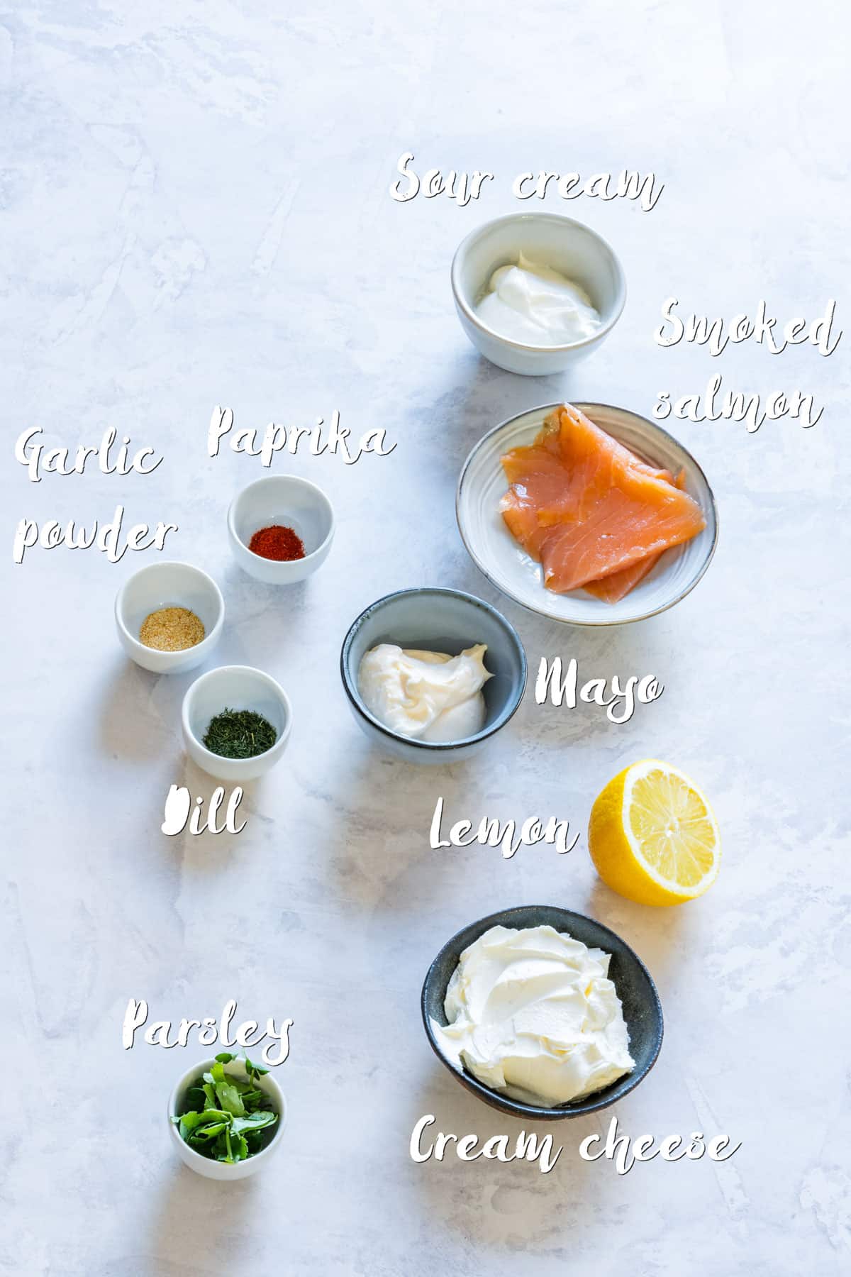 All ingredients of smoked salmon dip on the table.