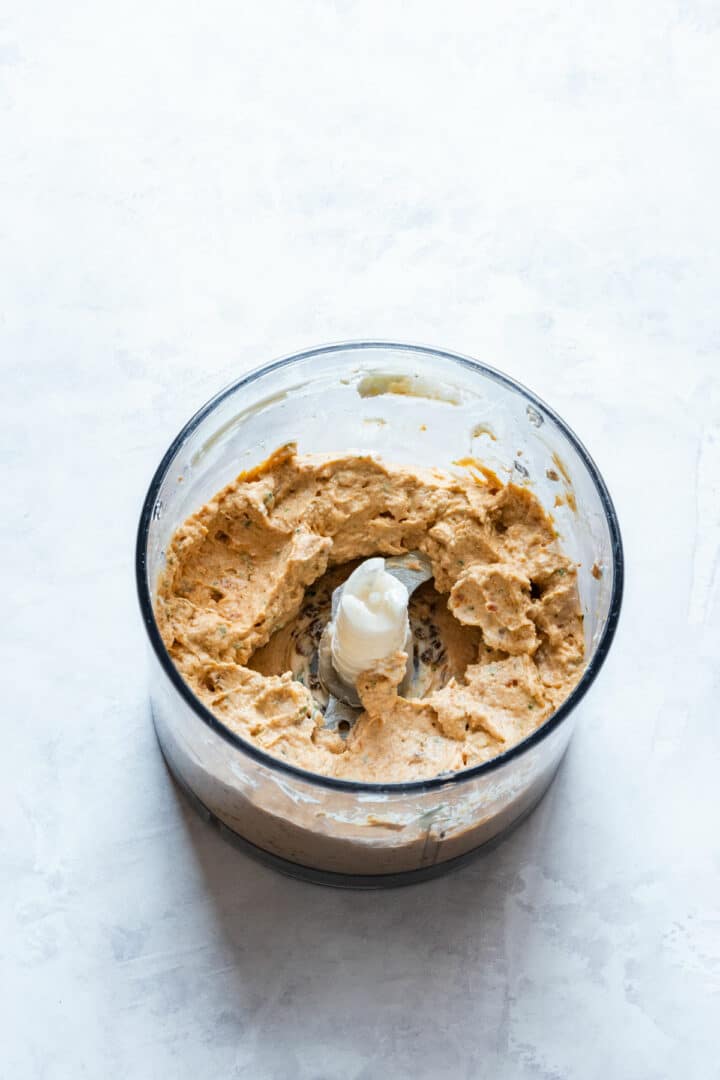 Blended creamy tomato mixture inside the food processor.