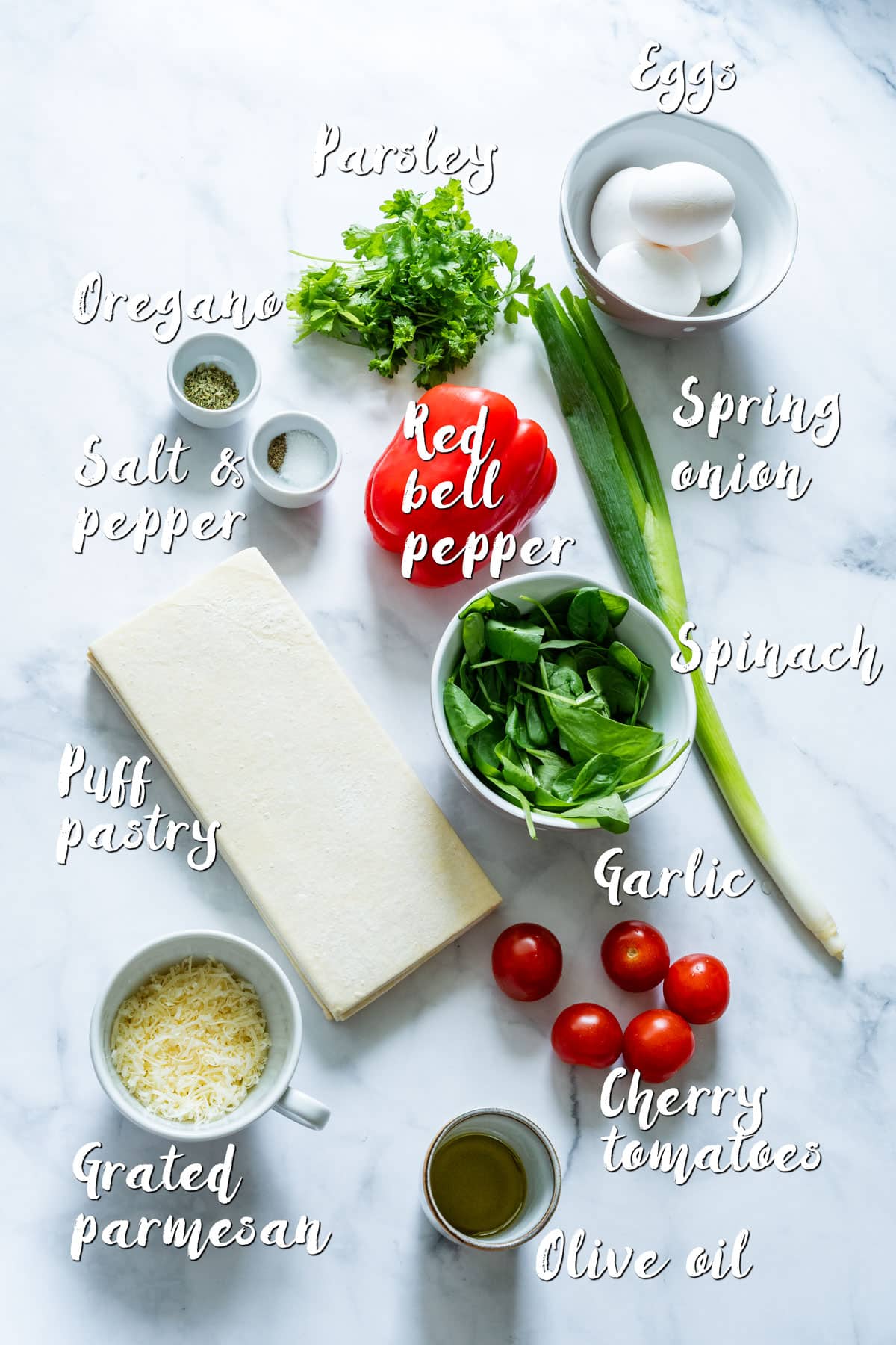Overhead view of ingredients for puff pastry mini quiches.
