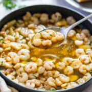 Spanish garlic shrimp, also known as gambas al ajillo, made with small shrimp, garlic and olive oil. An easy Spanish tapas appetizer ready in minutes. Serve it warm with crusty bread for dipping into the garlicky oil. Works with fresh, frozen or pre-cooked small shrimp.