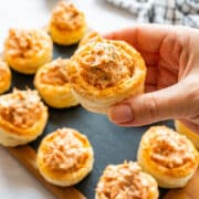 Salmon vol-au-vents are small puff pastry cases with a cold, creamy salmon filling flavored with lemon and dill. A make-ahead appetizer for parties and holiday entertaining.