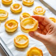Homemade vol-au-vent cases made with just puff pastry and an egg. These crisp puff pastry shells bake up hollow and ready for chicken, mushroom or seafood fillings.